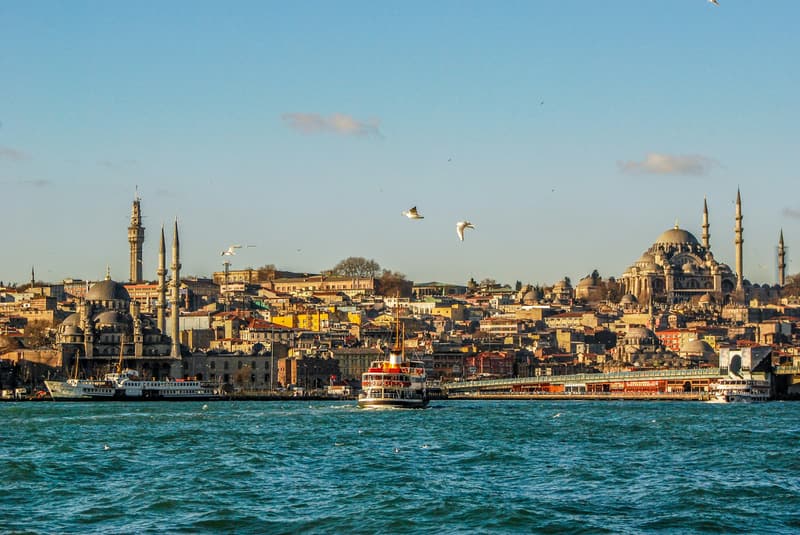 A ferry crossing the Bosphorus in Istanbul with the historic peninsula behind it